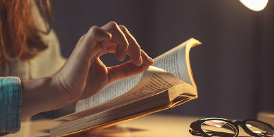 A writer brainstorming ideas with notes and coffee